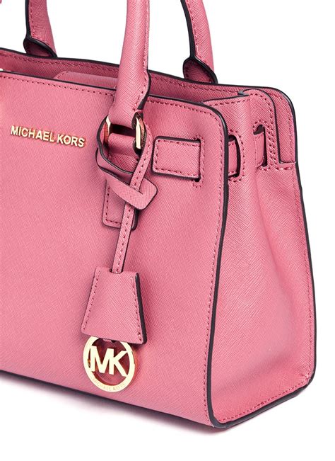 michael kors mini satchel pink|Michael Kors pink studded purse.